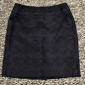 Ann Taylor 4P black and purple skirt. Fun textured circular design. Never worn.